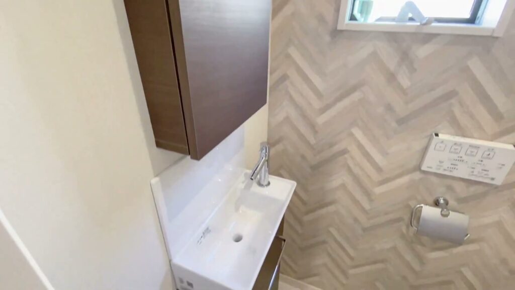ルミナフォート寝屋川 池田2号地 3LDKのトイレの手洗い