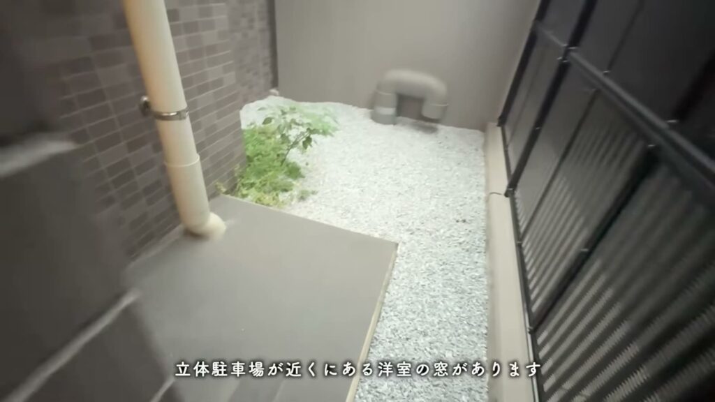 RJRプレシア別府駅前 4LDKの勝手口の外の庭