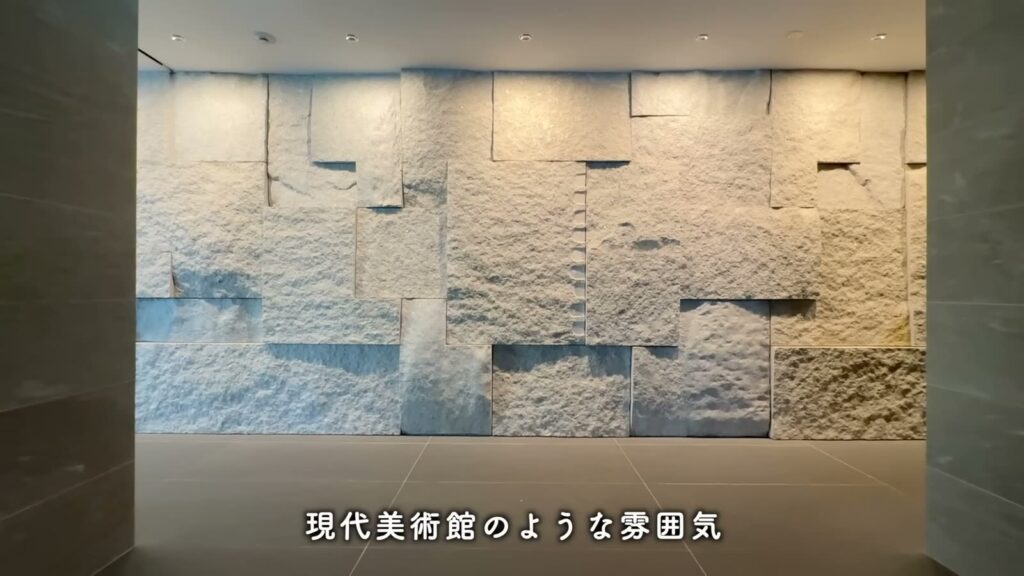 RJRプレシア六本松 2LDKの石の壁