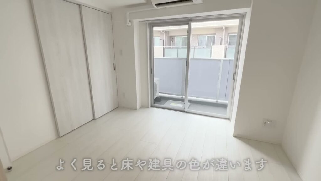 羽田のマンション 2Kの白ベースの洋室