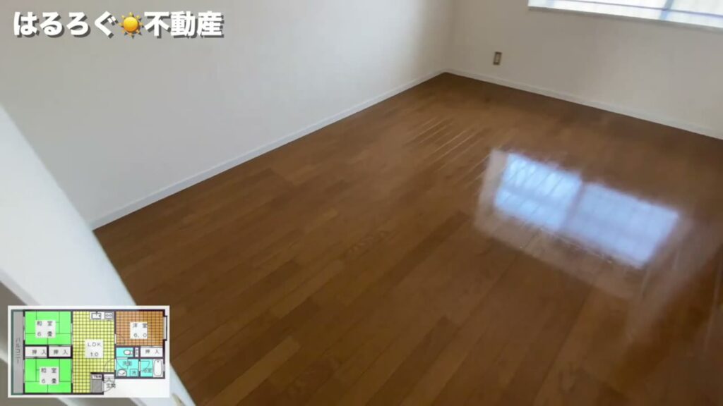 鴨原マンション 3LDKの洋室の床