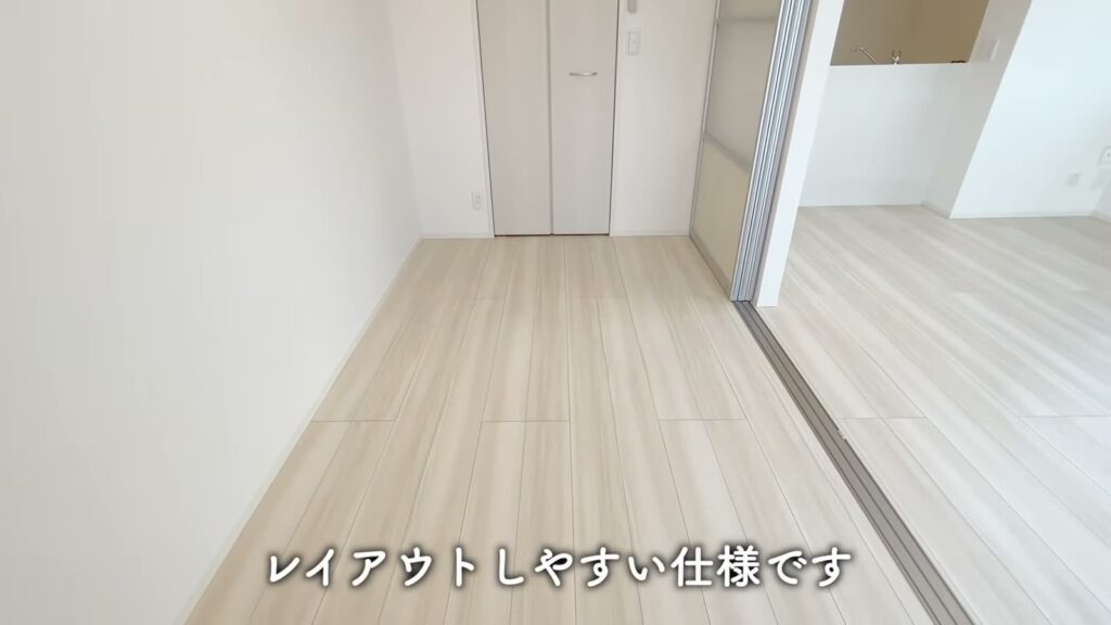 佐伯区の1LDK 1LDKの洋室とLDK側