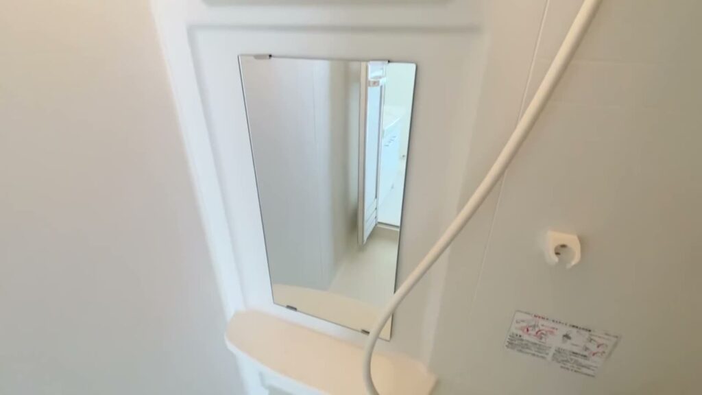 広島市南区の1LDK 1LDKの鏡とシャワー