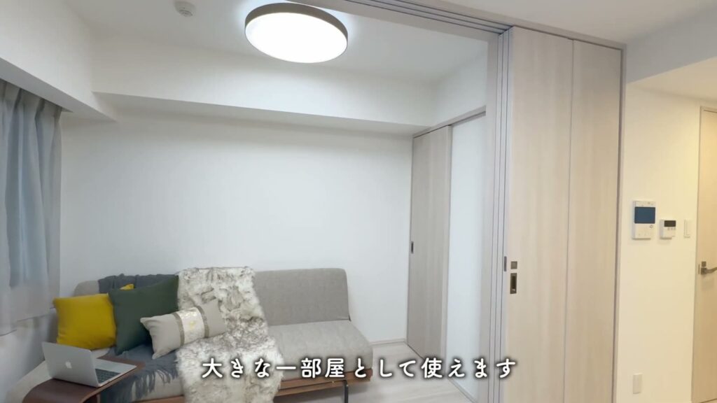 プレシスヴィアラ千葉登戸 1LDKの仕切りを開けた洋室